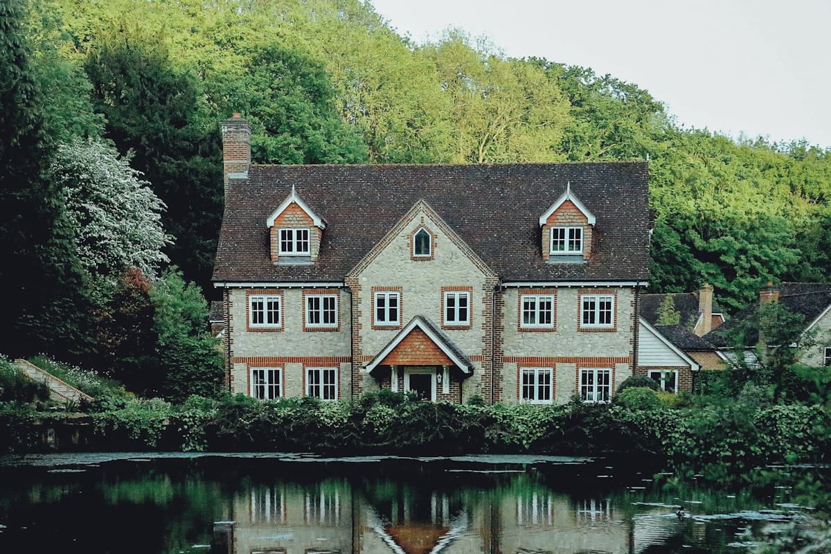 Historic stone manor house with restored brick detailing